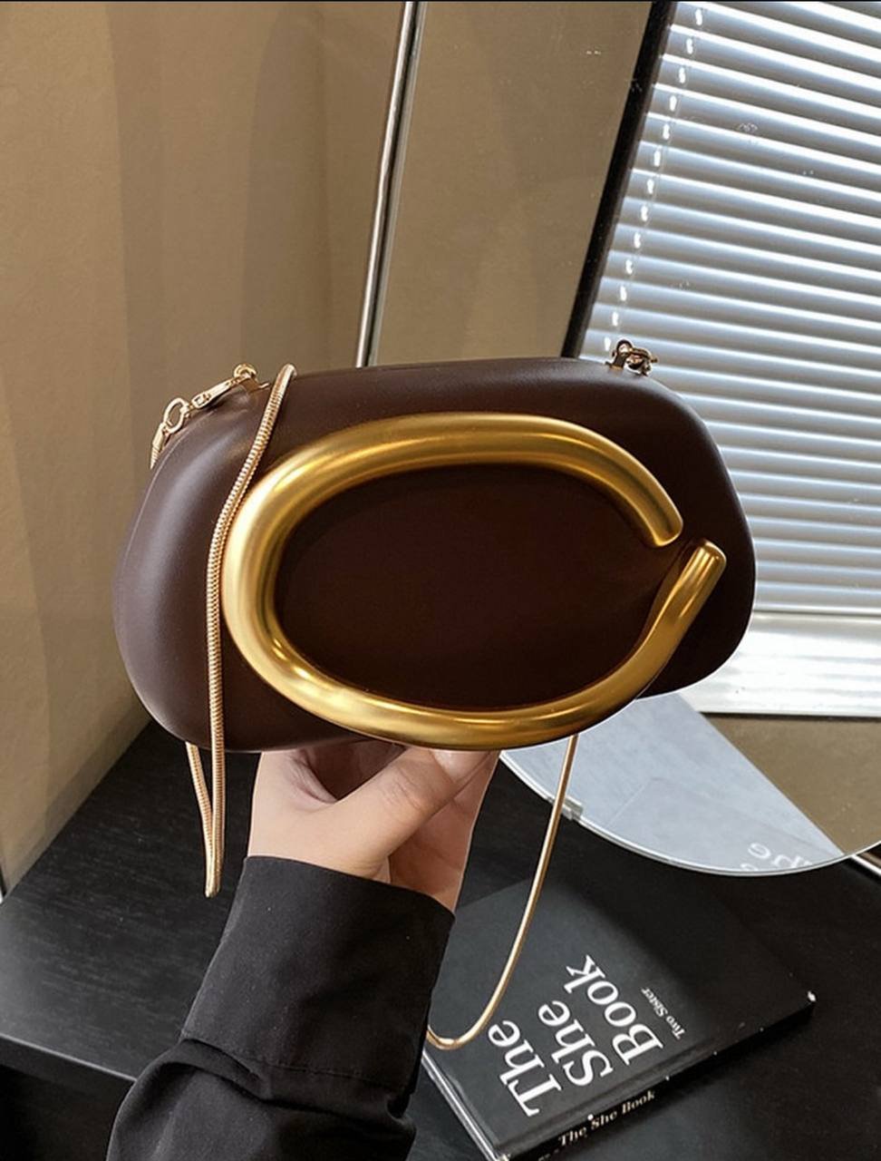 Burgundy clutch bag